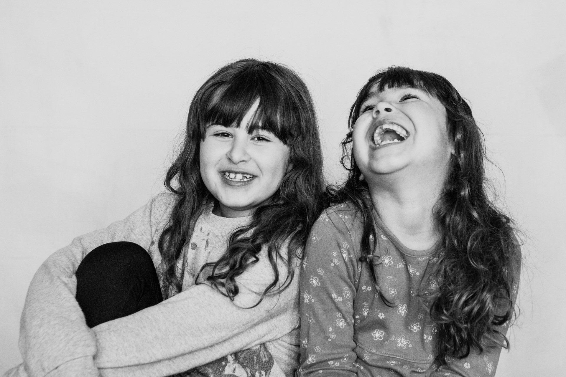 Portrait of two girls, best friends laughing